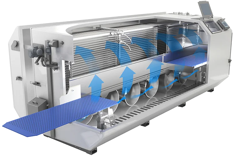 Cutaway view of the OctoFrost IQF freezer highlighting its internal airflow system. Blue arrows indicate the even, upward flow of cold air circulating around the product zone for efficient and uniform freezing. The machine features a modular, stainless steel design with a control panel and perforated conveyor belt sections.